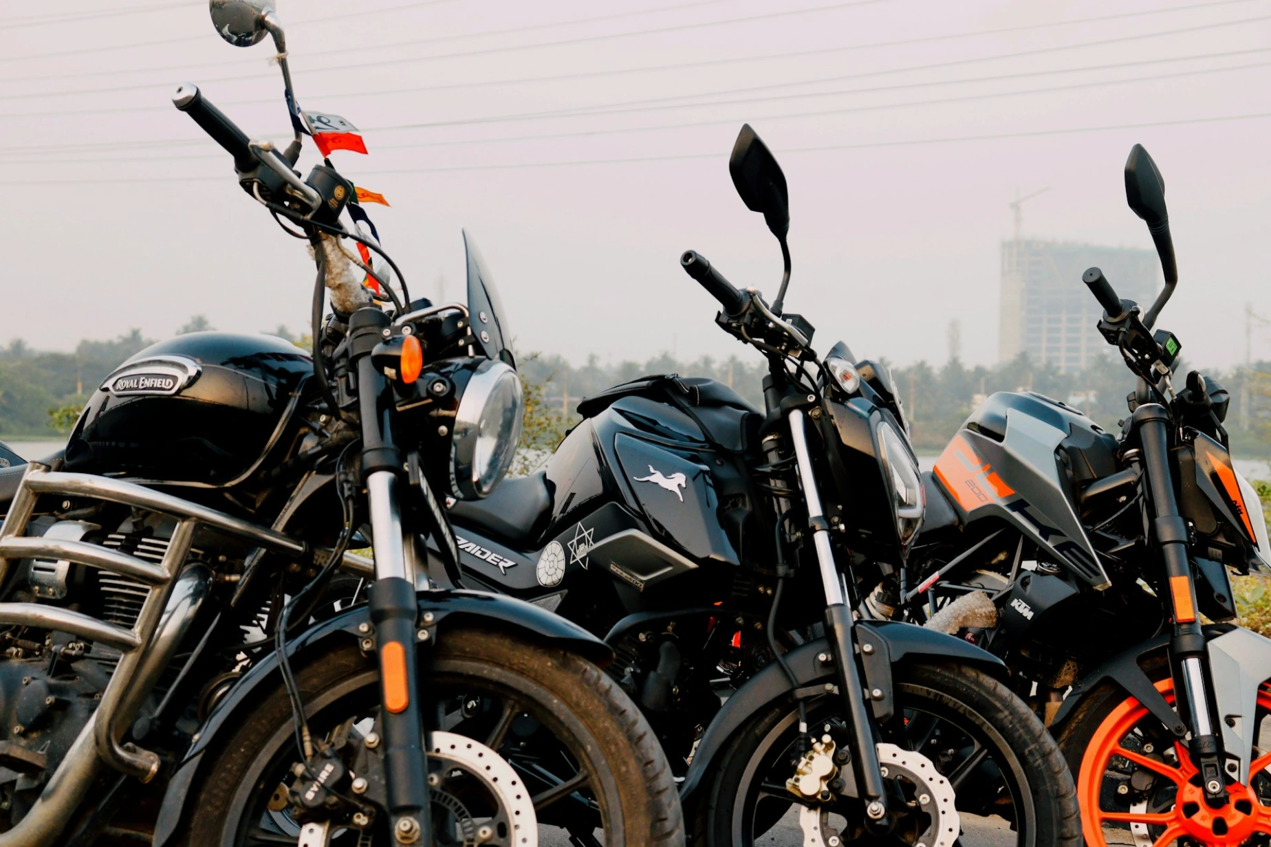 a group of motorcycles parked next to each other